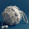 Edición «Button Bow Sphere» en color Porcelain