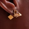 Pendientes de botón Éole, edición chapada en oro de 24 quilates