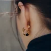 Pendientes Éole Curled, edición dorada